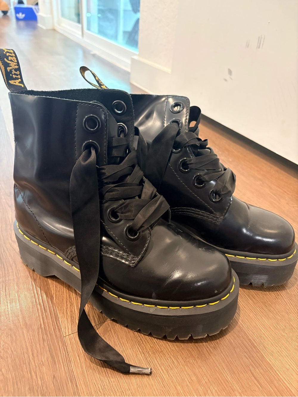 Dr. Martens Black Leather Platform Lace-Up Boots with Yellow Welt